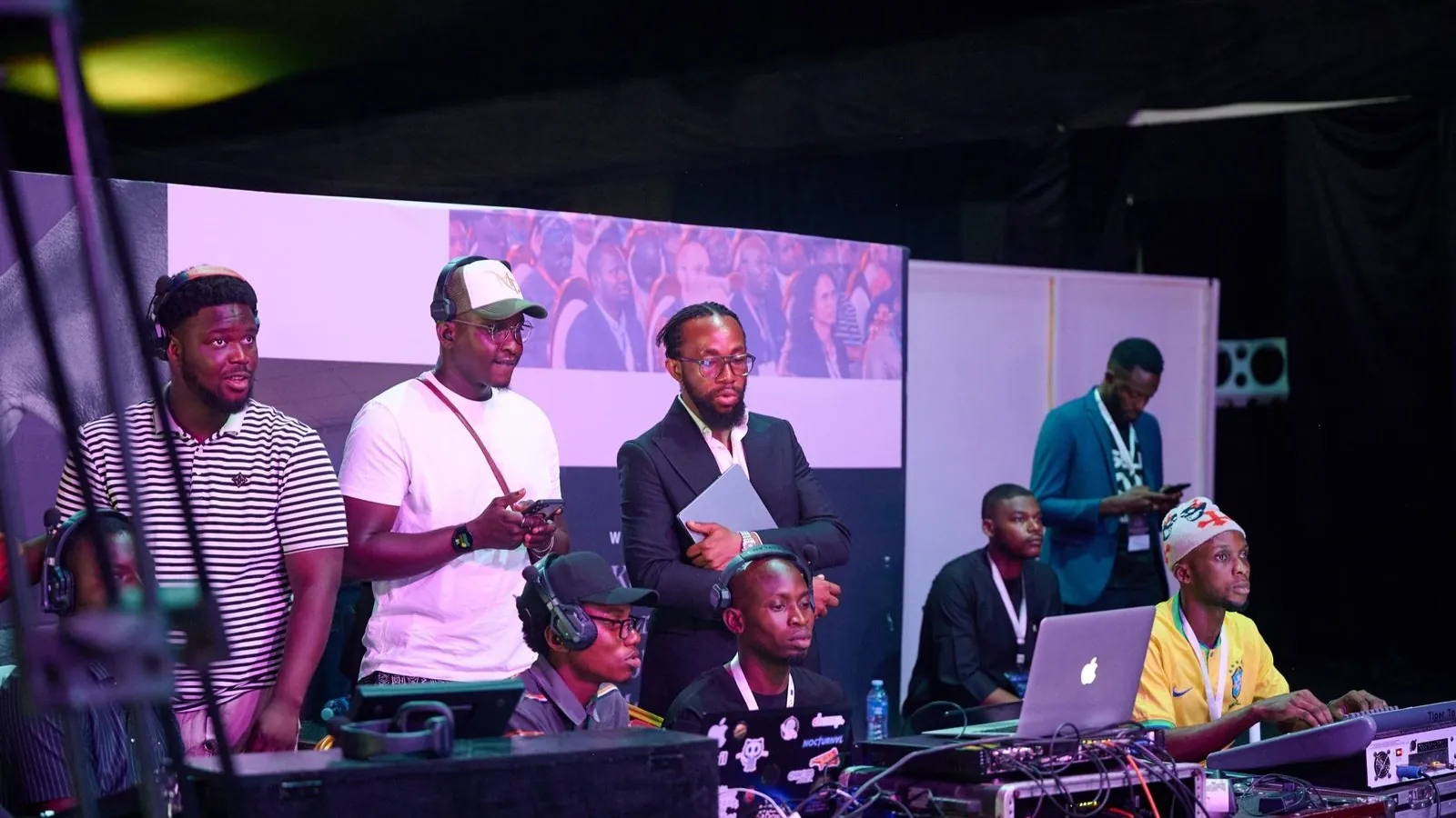 David ’Tobi Oyawoye with the production crew at the mixing desk