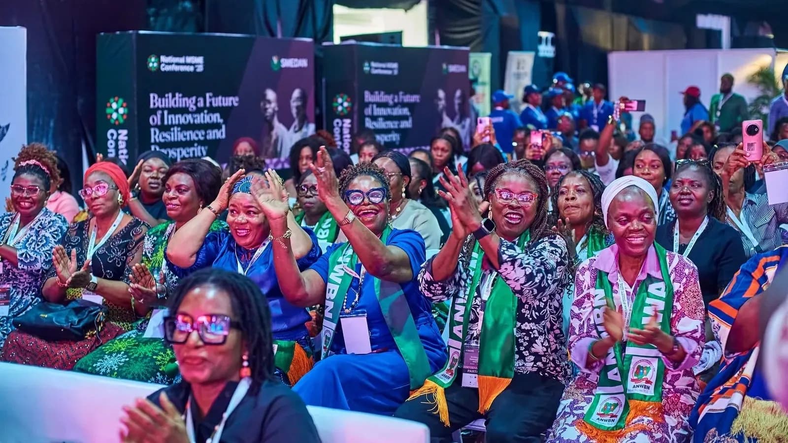 Delegates cheering in the hall