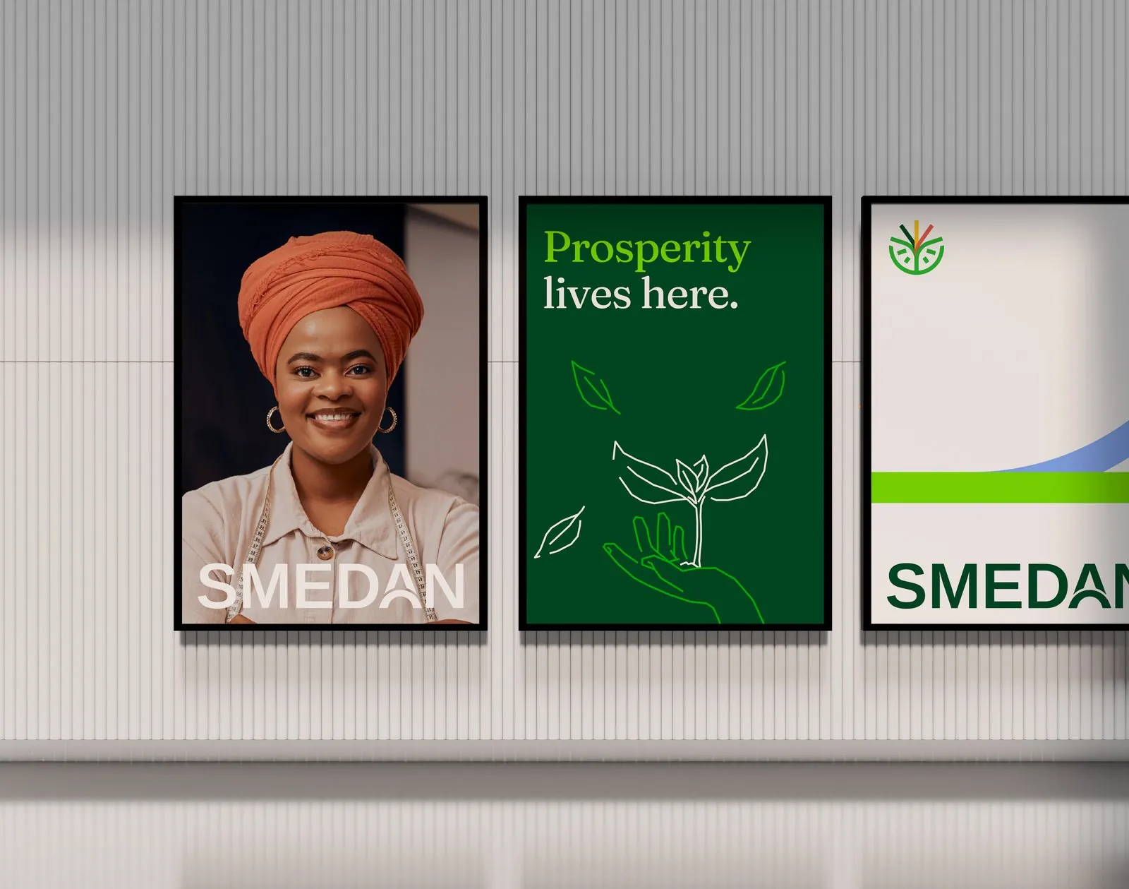 SMEDAN posters on a wall, including Prosperity lives here