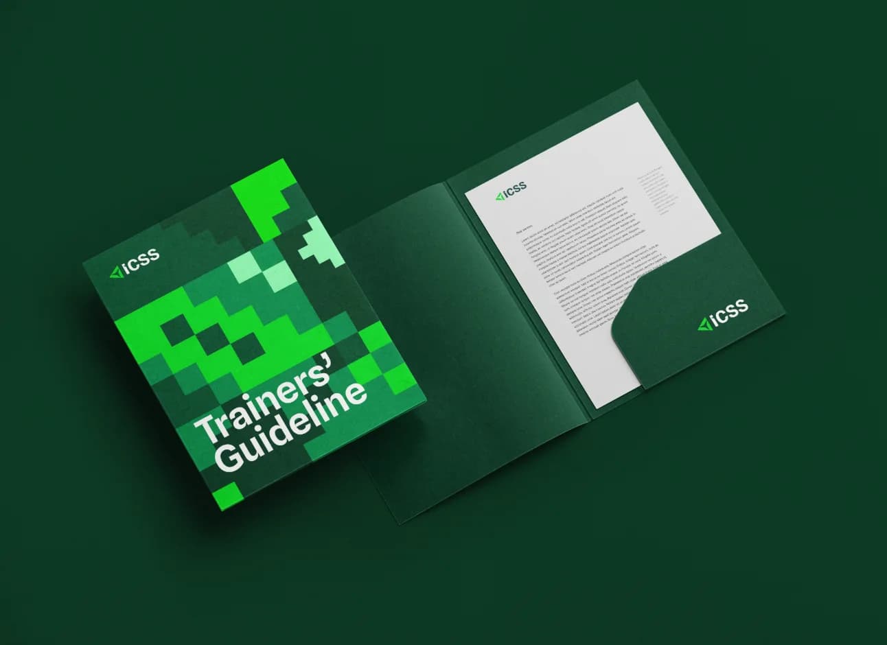 The Trainers’ Guideline: a green folder with the pixel pattern